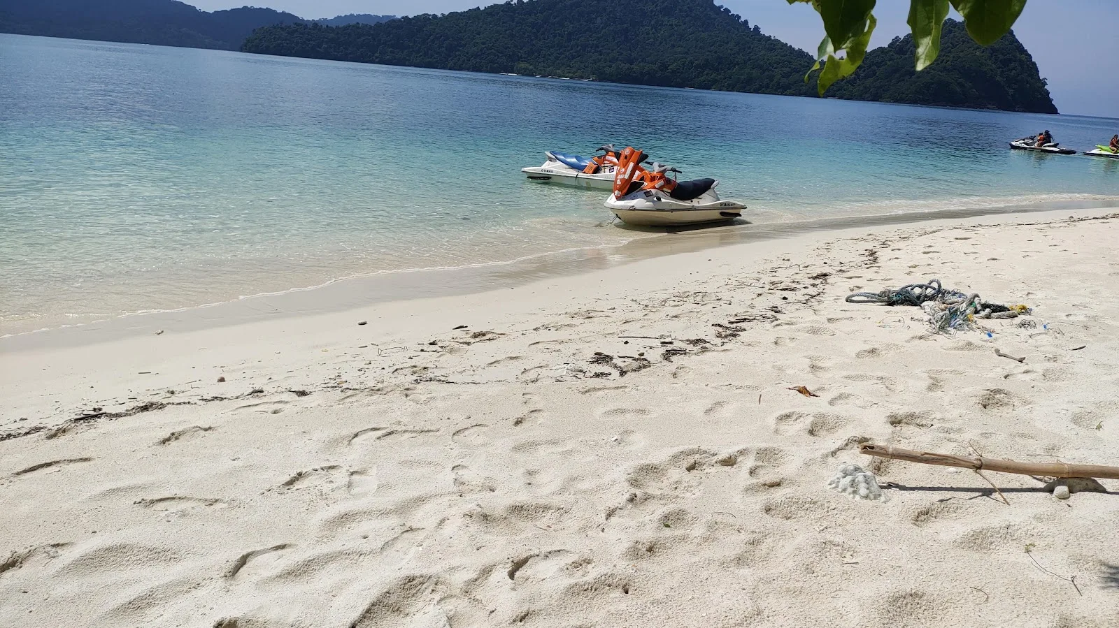 A jet ski beside a sandy island beach in Alyna’s tour gallery